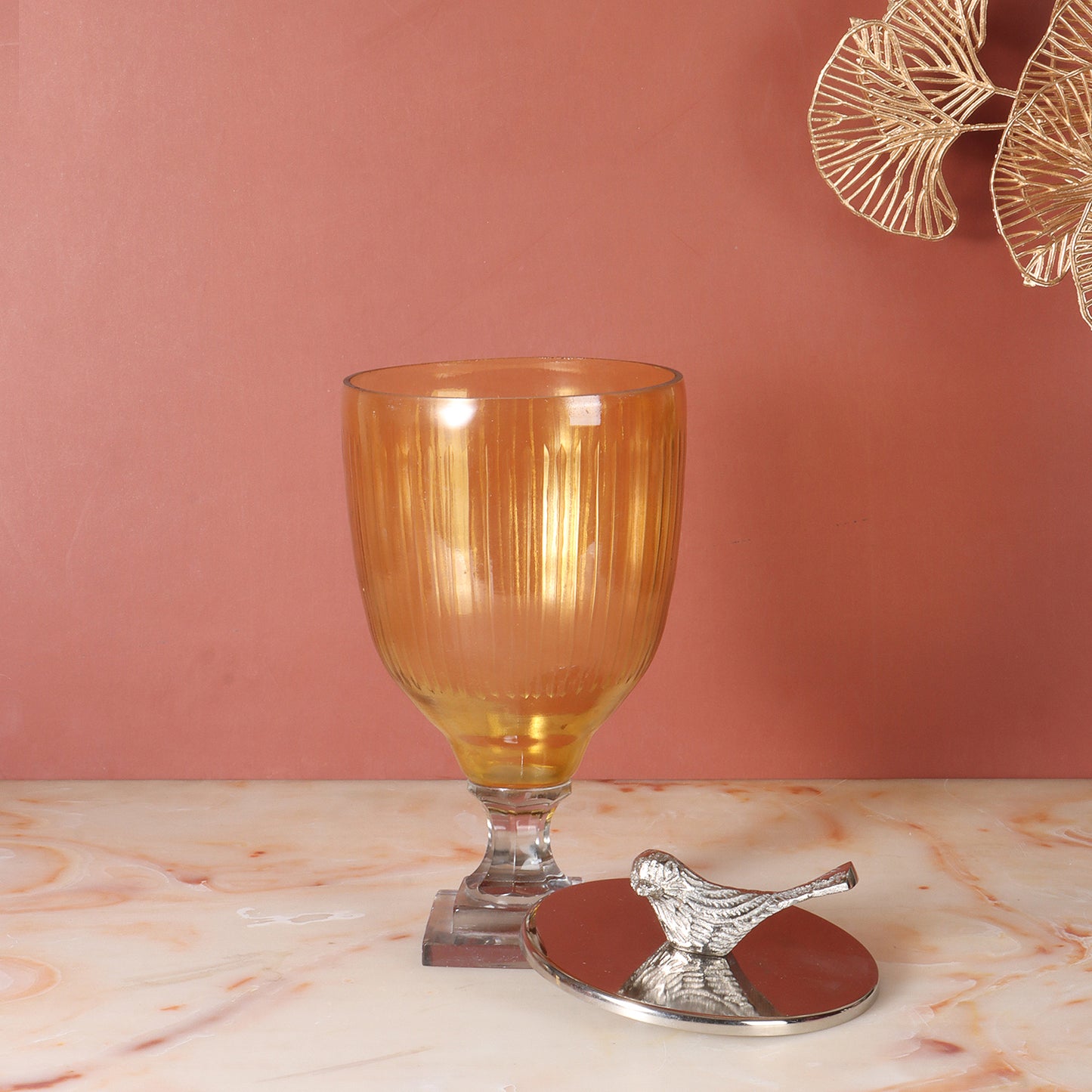 Amber Beauty: Tall Glass Vase with Metal Bird Cap and Elegant Stand